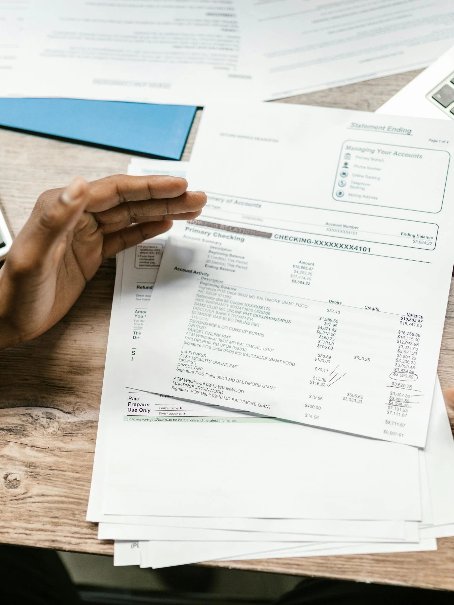White papers arranged on a table